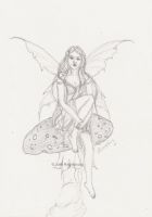 Faery sitting on a toadstool